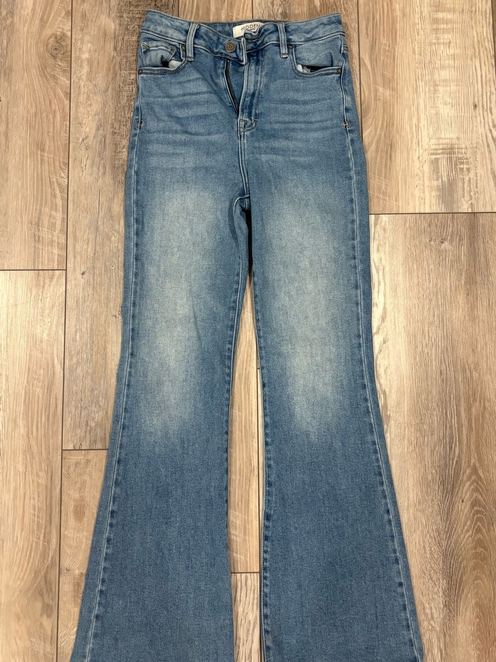 High-Rise Flared Jeans in Faded Blue — Womens